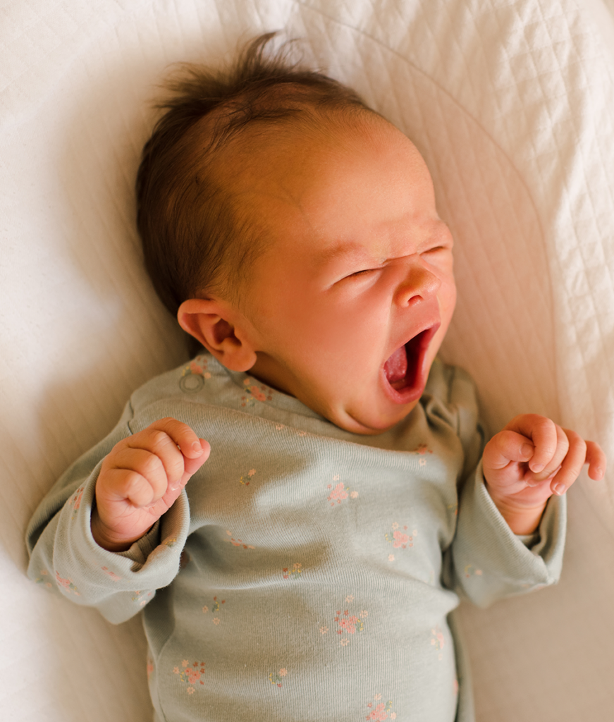 common myths about baby sleeping yawning baby